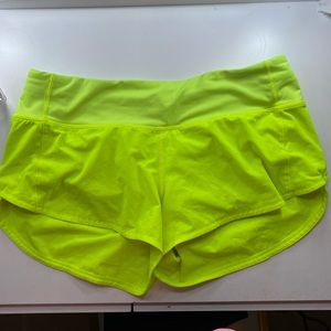 highlight yellow lulemon 2.5 inch speed up shorts